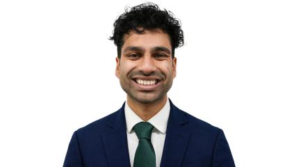 A headshot of councillor Ryan Jude, he's looking at the camera and smiling