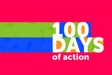 A red, green and blue horizontal striped banner that reads on the right hand side '100 days of action'