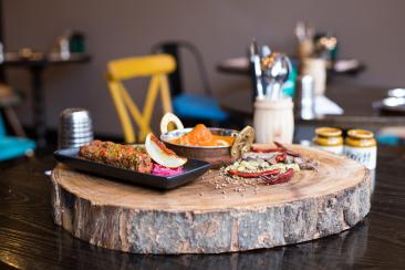 Food on a rustic log style platter