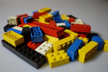 Colour photo of pile of Lego bricks