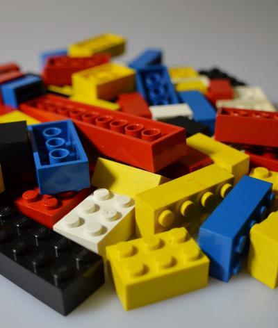 Colour photo of pile of Lego bricks