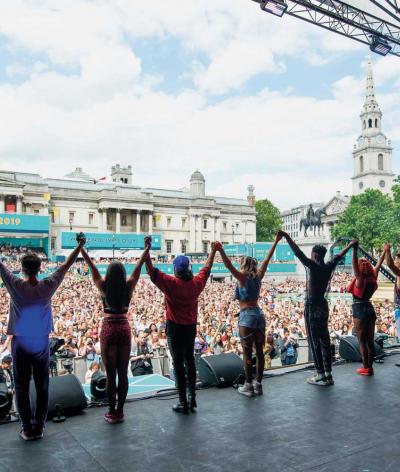 Picture of performers on stage at event in Trafalgar Square.