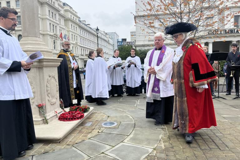 The Lord Mayor and senior members from the council paying their respects at a community service in Lancaster Gate