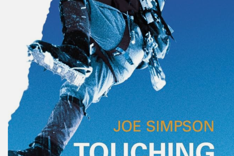 A book cover of Joe Simpson's book, Touching the Void 