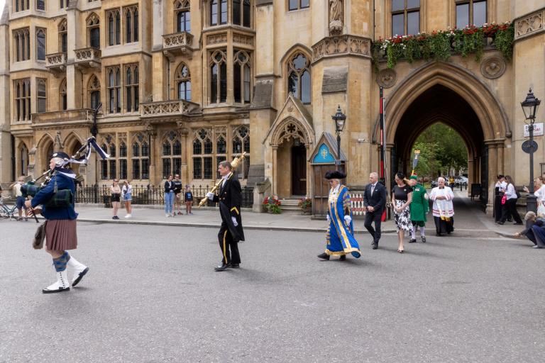 The Lord Mayor walking through Deans Yard outside Westminster Abbey ahead of her civic service