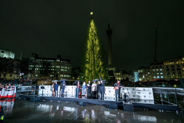 The Lord Mayor of Westminster on stage with VIPs in front of the Trafalgar Square Tree