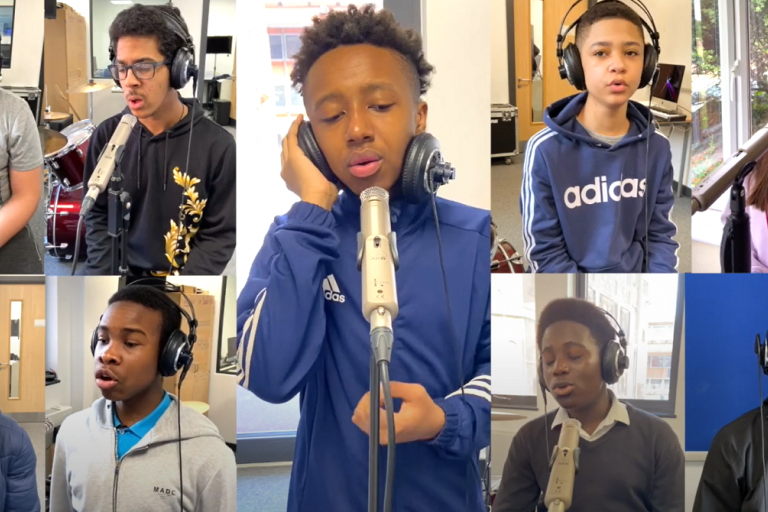 Westminster City School musicians singing together in a music video.png