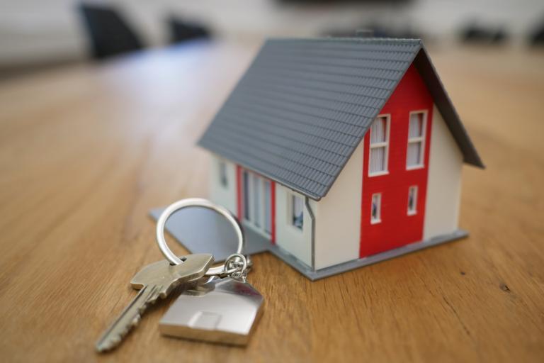 Image of small house and key