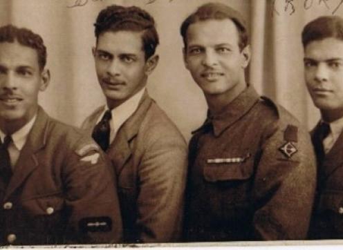 image of four men in uniform