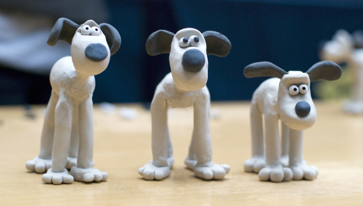 Three plasticine images of Gromit to dog